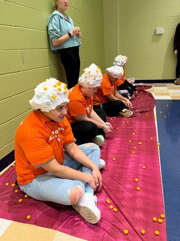 Springfield College Students playing with local elementry school students